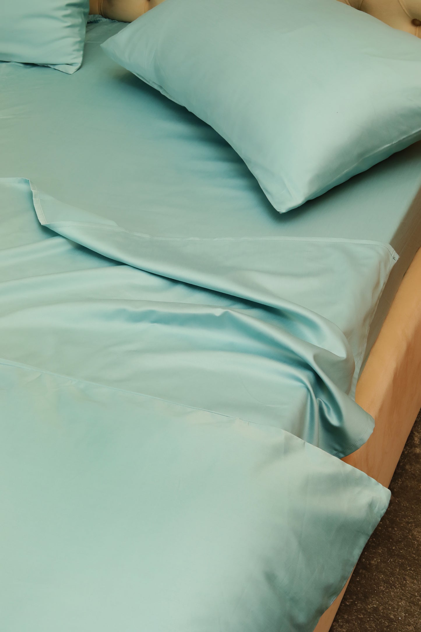 Soft sky blue bed sheets set with matching pillows close-up