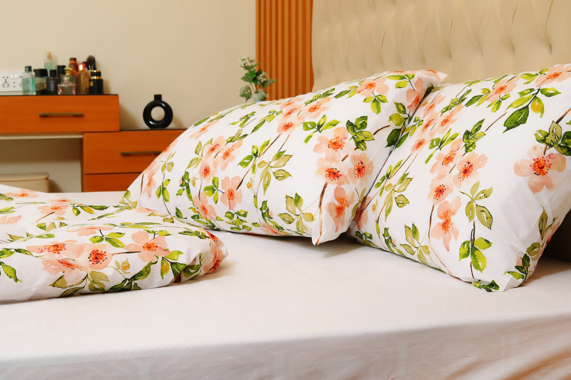 Elegant printed cotton percale quilt cover set displayed on beige bed